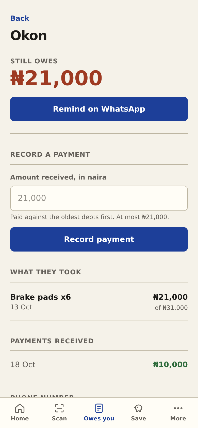 A customer's page showing what they still owe, a WhatsApp reminder button and a payment form
